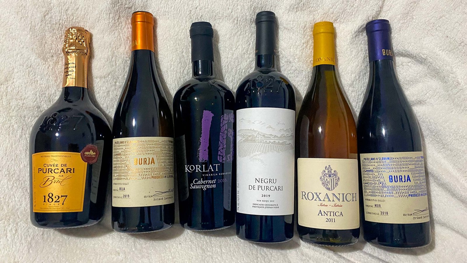 Entrega de 6 botellas de vino de 8 vinos.